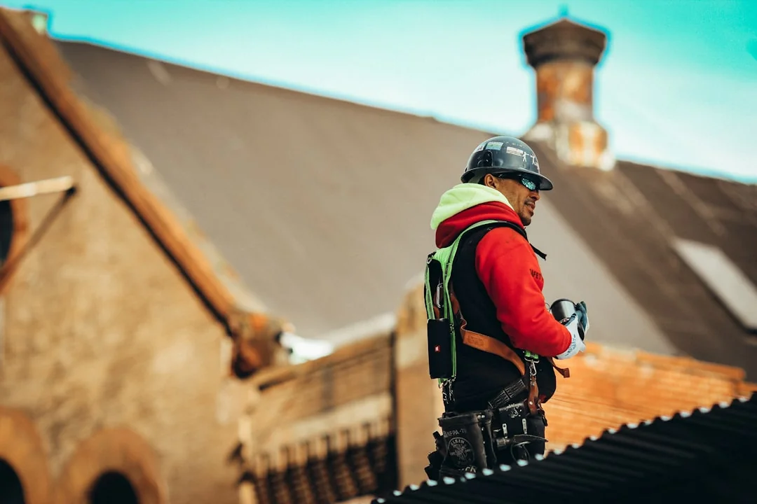 Worker with red coat
